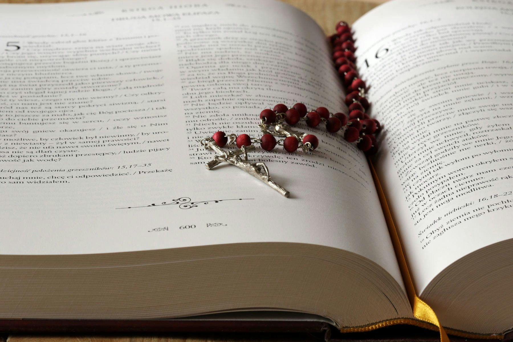 Catholic rosary on a Bible