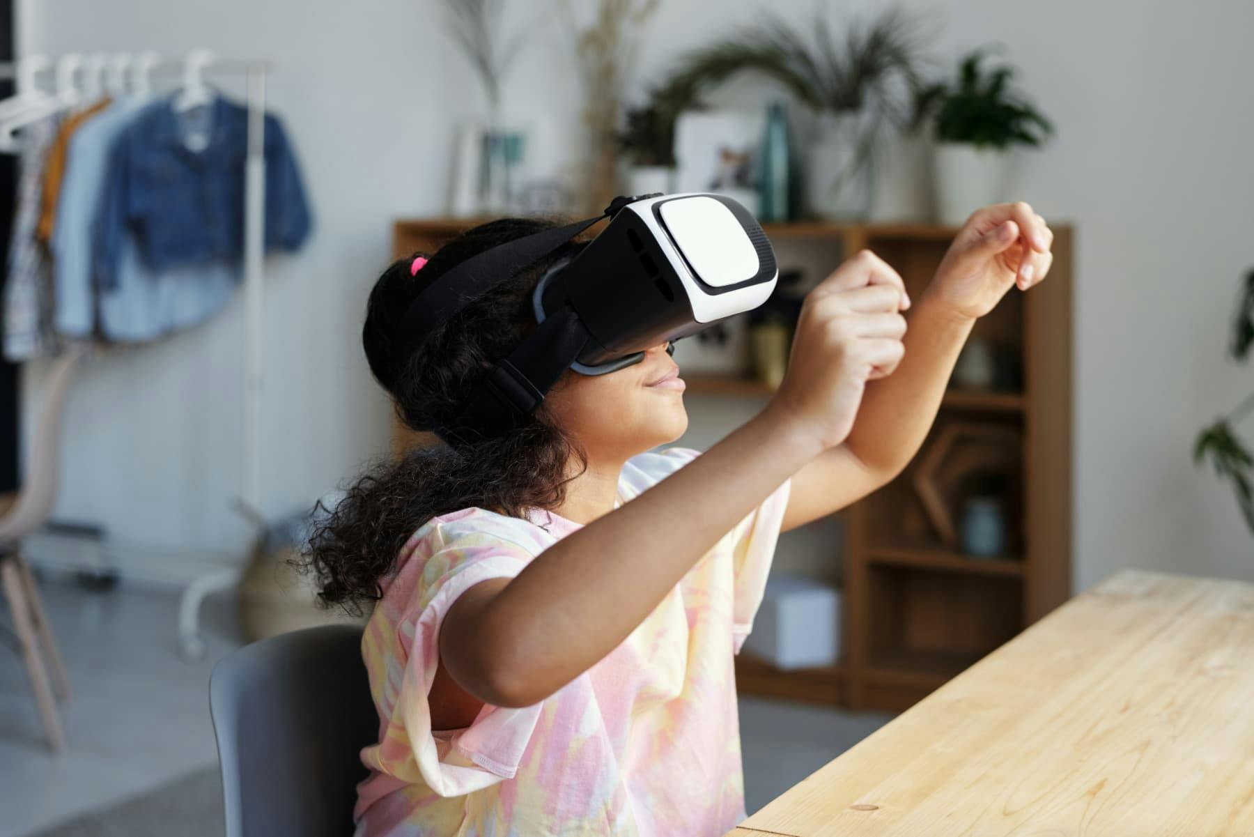 girl VR headset metaverse raising both arms