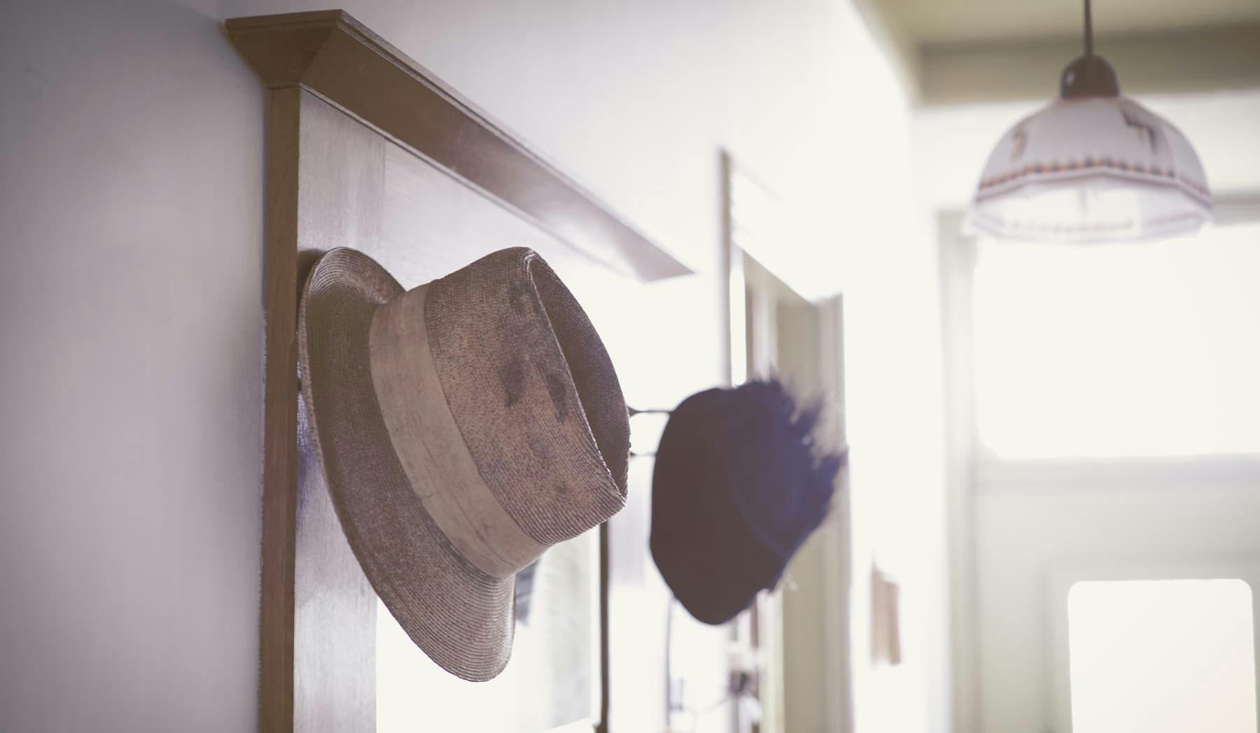 hats hung entrance